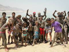 Family trip to Israel visiting the Dead Sea and enjoying a mud wrap. 